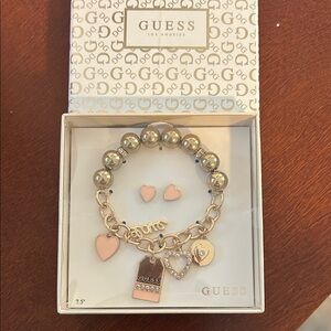 Guess Gold-Tone Bracelet with Pink Heart Charms & Studs